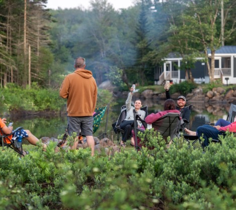 HTR Adirondacks riverside cookout and family gathering around the bonfire