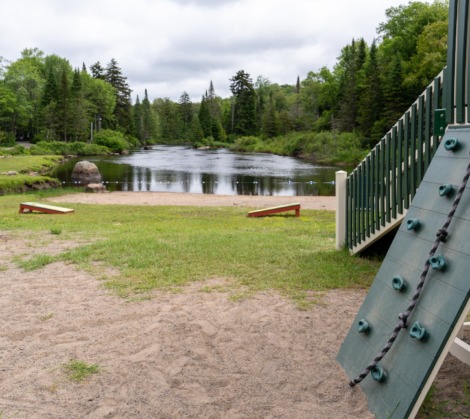HTR Adirondacks river and sandy beach with playground and yard games