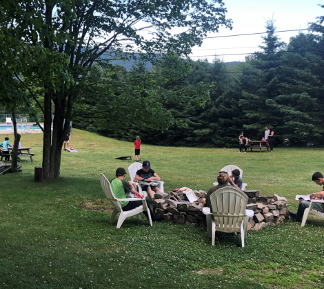 people siting together outside in acadia